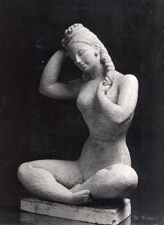 Sculpture of a seated female figure by Dora Gordine