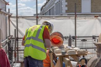 Stone carver Sam Kelly working on site at Dora House Saving Dora House - All About Stone